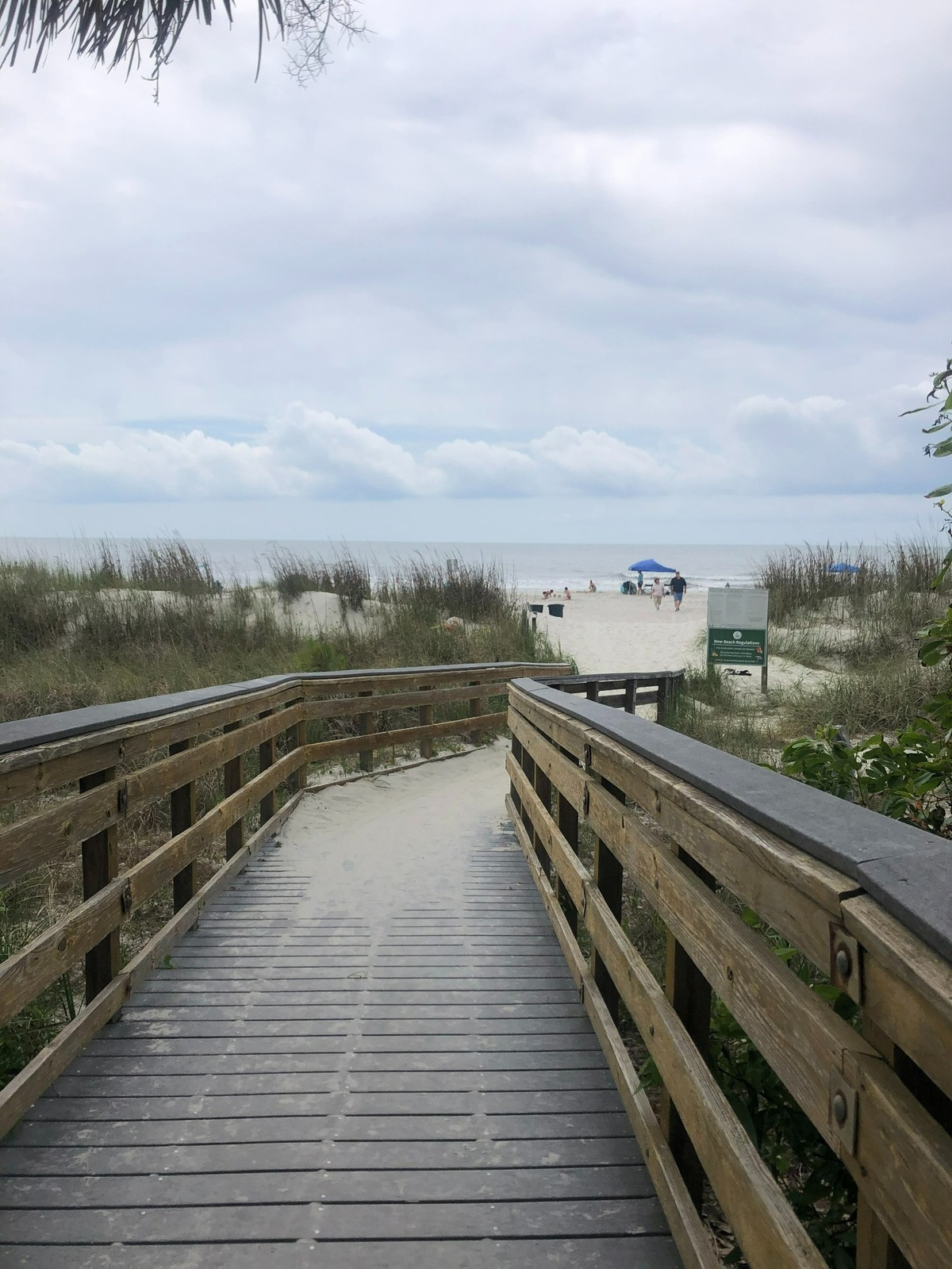 A boardwalk in Palmetto Dunes leads to a crowded Hilton Head Island beach on Memorial Day weekend 2021.
