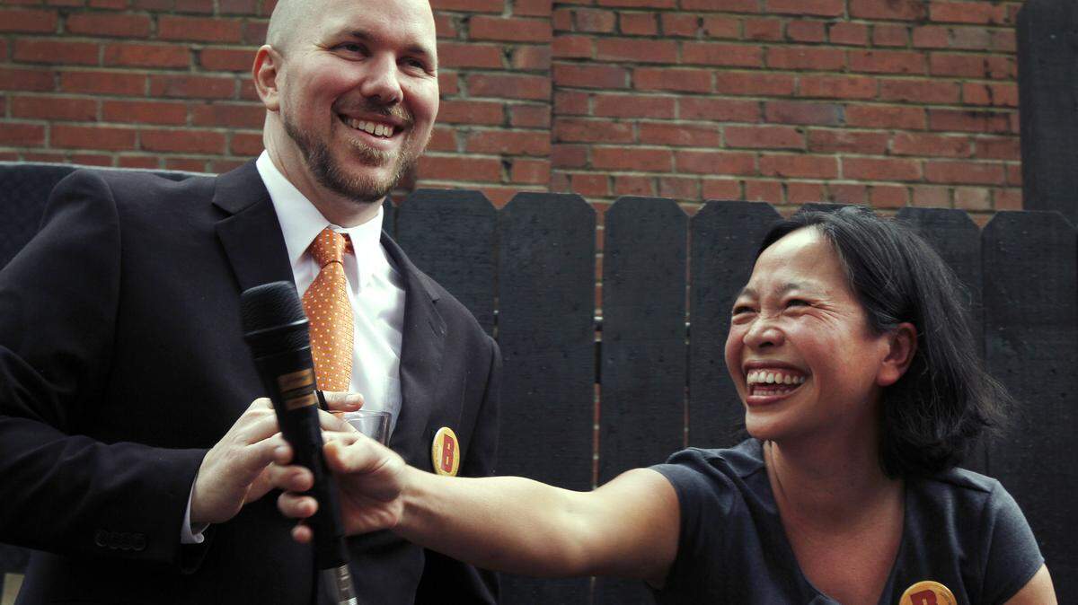 Beaufort International Film Festival alum V.W.  Scheich, who will co-direct the film "Basement Bob," and his wife, Uyen K.  Le, laugh while discussing the latest news on the film "Basement Bob"  during a Beaufort Film Society Meet & Greet at The Old Bull Tavern,  2015 West St., Beaufort, on May 7, 2015. 
