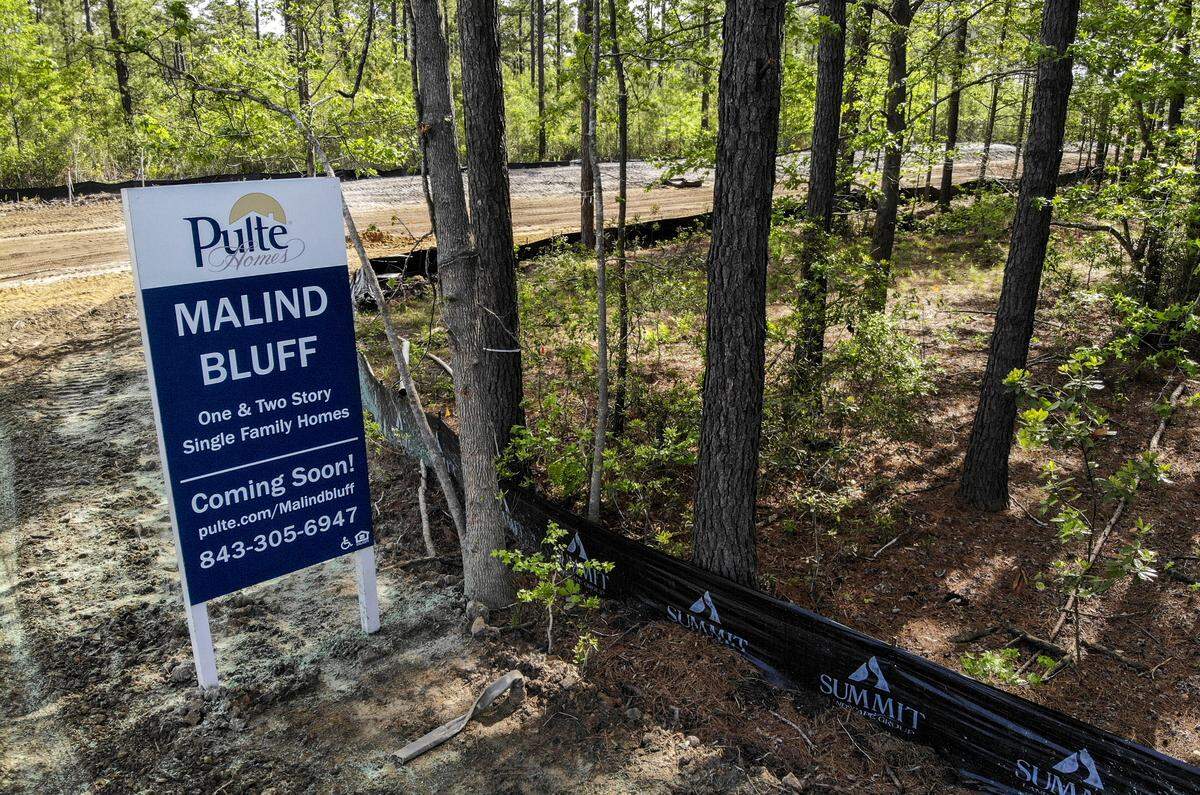 A sign along S.C. 170 at Pritcher Point Road in Okatie, as seen on Wednesday, April 1, 2020, announces the soon-arrival of Malind Bluff, a gated housing development. Builder Pulte Homes, approved to build 330 homes, will offer one and two-story homes starting in the mid-$200,000’s on the marshes of the Okatie River.