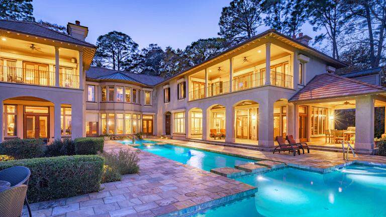 This $5.295M SC home sits on a 20-foot bluff overlooking Port Royal Sound. Take a look