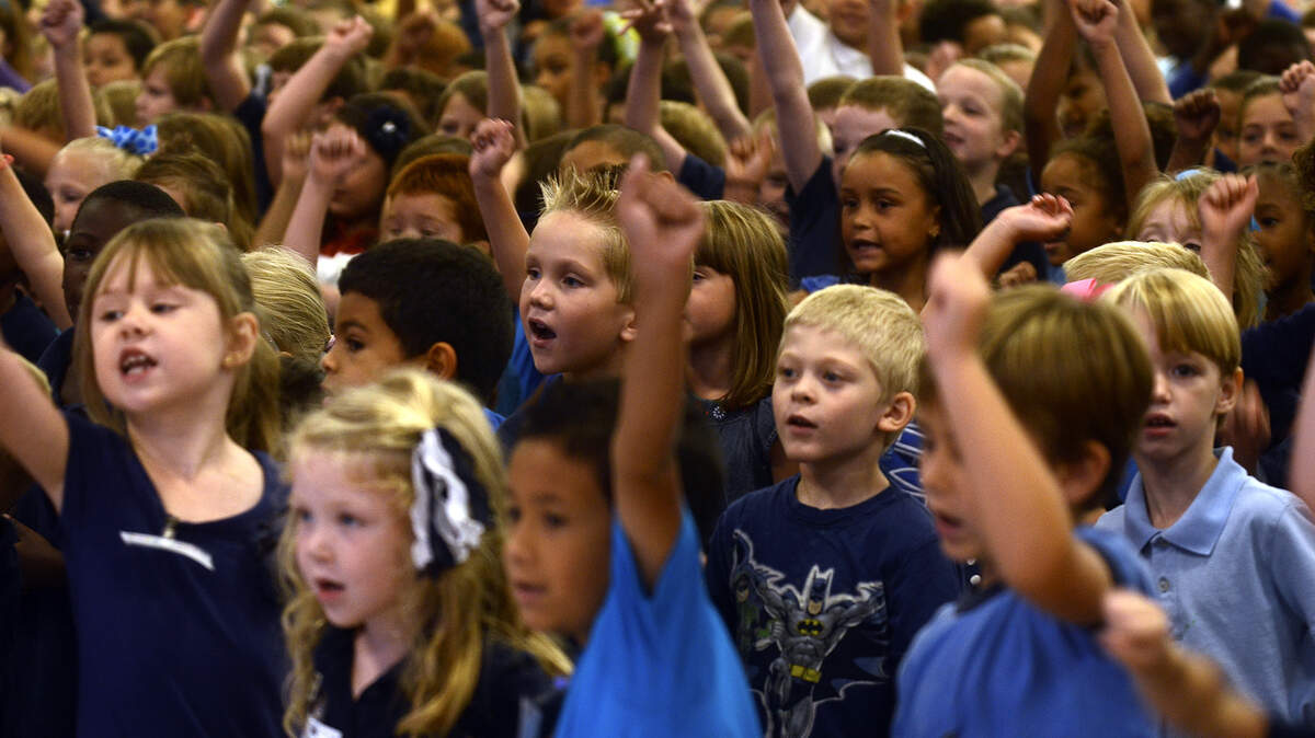 Students from Okatie Elementary School celebrate after superintendent Jeffrey Moss announced that they were one of the five South Carolina schools being awarded a 2013 National Blue Ribbon Schools award during an assembly on Tuesday morning at Okatie Elementary School.