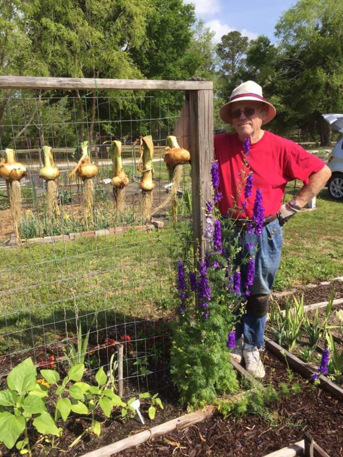 Ron Titus, an avid gardener, shows off his crops.