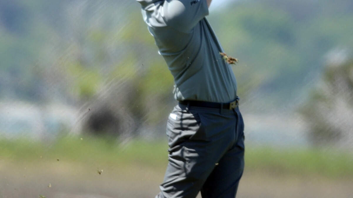 Luke Donald watches his shot from the fairway on No. 18 during Wednesday's RBC Heritage pro-am at Harbour Town Golf Links on Hilton Head Island, S.C.