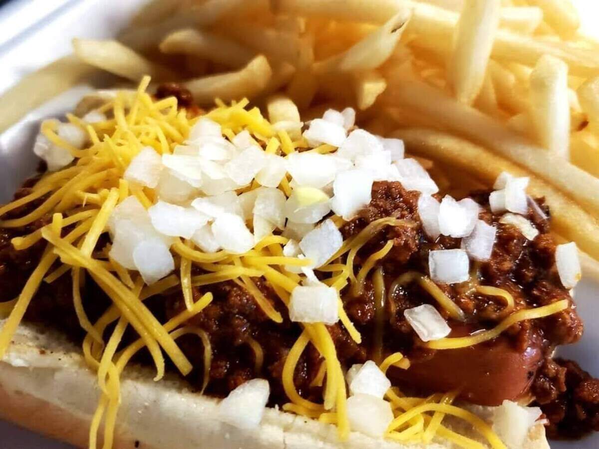 A Detroit-style coney is topped with chili and onions at J. Lee’s Coney Island in Beaufort.