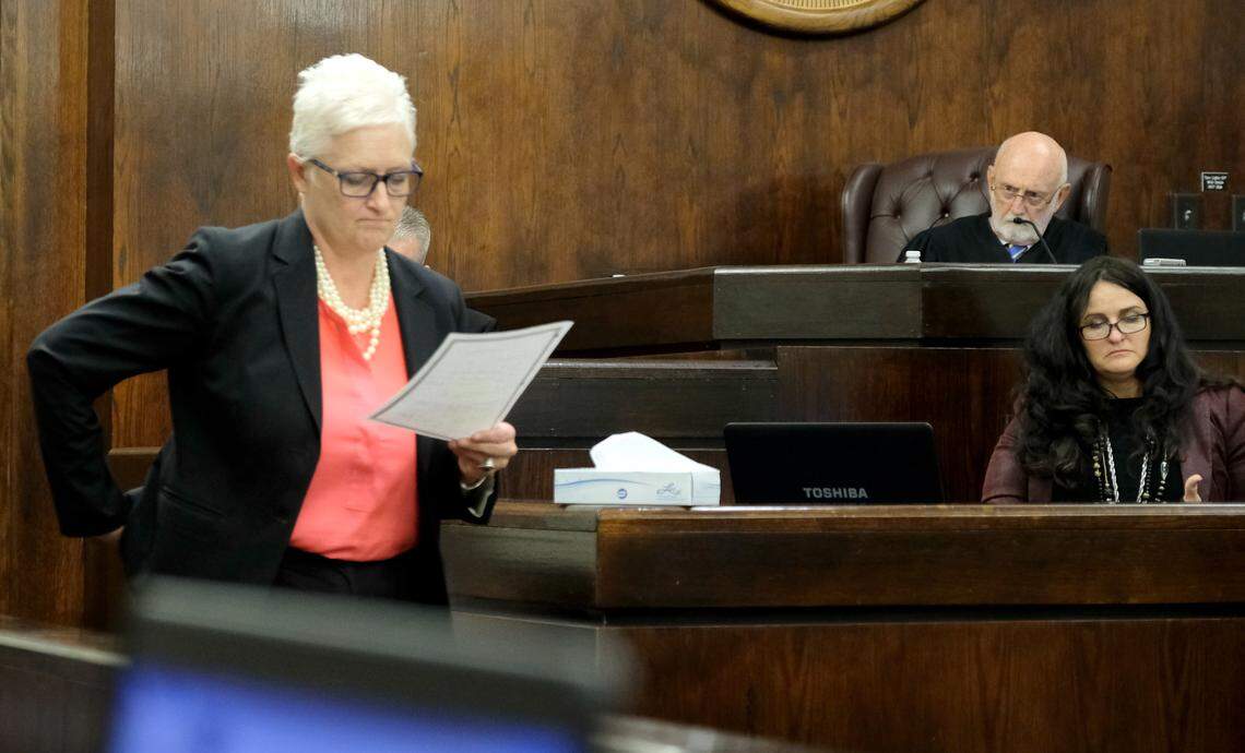 Judge Brooks Goldsmith, right, listens as Trasi Campbell, left, Chief Public Defender, questions Maj. Bob Bromage about whether evidence in a 1983 sexual assault should be allowed in Isaiah Gadson Jr.’s trial.