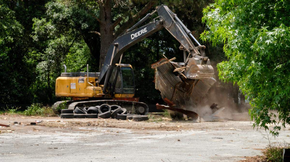 Demolition of buildings are nearly complete, as seen on Tuesday, May 11, 2021, on property the Town of Hilton Head Island owns at U.S. 278 near Squire Pope Road. The site had been rented by Carolina Seafood & Produce but had to move after the town of Hilton Head Island purchased the land in August. The clearing is expected to be complete by Friday.