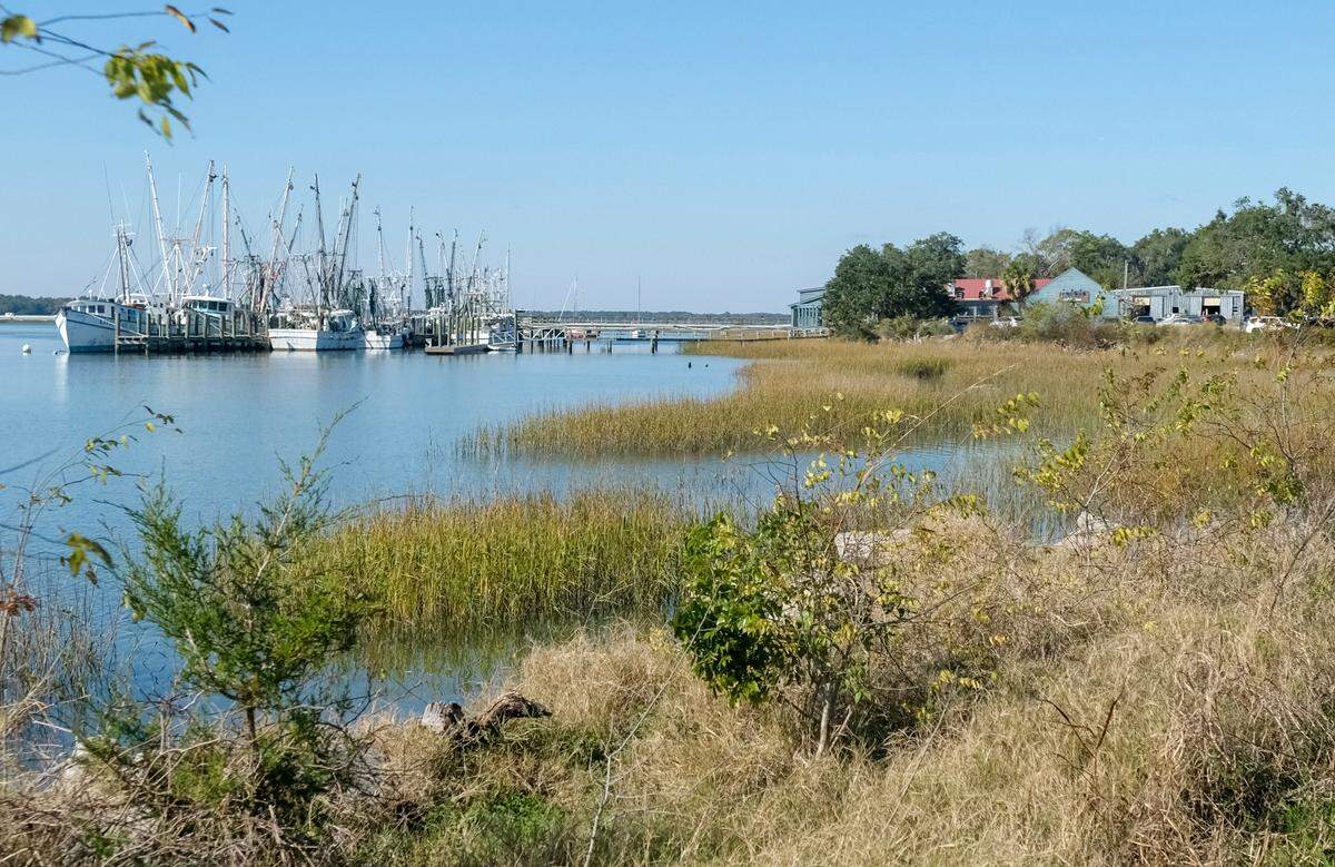 Shrimp boats, from left, are moored at the Port of Port Royal shrimp docks as seen on Dec. 8, 2020. The area at the end of 11th Street includes Fish Camp on 11th Street restaurant, the site of a future brewery and the seafood processing facility leased by the Town of Port Royal.