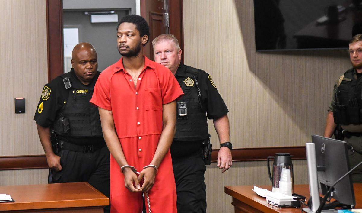 Jonas Jerry Washington Jr, enters the courtroom, refusing to look anywhere but towards Circuit Judge R. F. Cothran, Jr. on June 24, 2025 at the Sumter County Courthouse in Sumter. Ernest “Chip” Finney, solicitor with the S.C. Third Judicial Circuit has charged Washington, Jr. with the murder of Sophia Van Dam and the kidnapping her two-year old son, Matteo Van Dam. The two Van Dam’s were last heard from June 24, 2023, two years to the day.