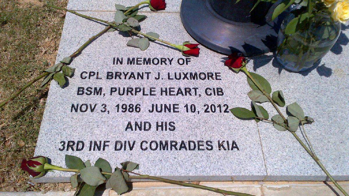 This marker at the base of a flagpole at the National Infantry Museum at Fort Benning, Ga., helps others remember the cost and sacrifice of war.      