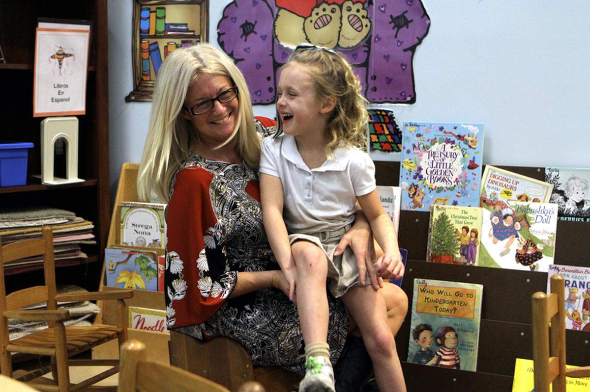 Daisy Bobinchuck and daughter Charli pose for a portrait Dec. 4 2013 at Hilton Head Island Early Childhood Center. Charli passed away in 2018 after she was struck and killed by a car on U.S. 278.