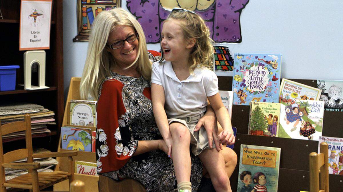 Daisy Bobinchuck and daughter Charli pose for a portrait Dec. 4 2013 at Hilton Head Island Early Childhood Center. Charli passed away in 2018 after she was struck and killed by a car on U.S. 278.