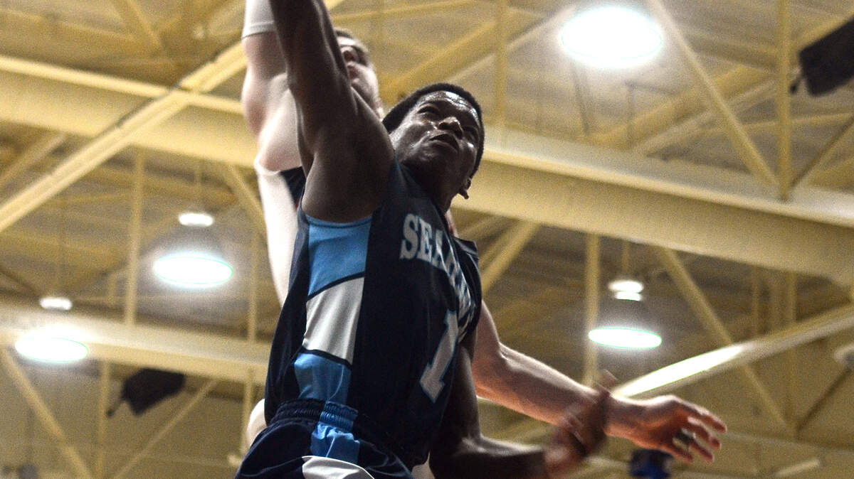 Hilton Head Island High's Bryce Singleton looks to score during a game against Grainger High School on Monday afternoon during the Seahawk Holiday Classic in the gym at Hilton Head Island High School.  Hilton Head High won 58-54.