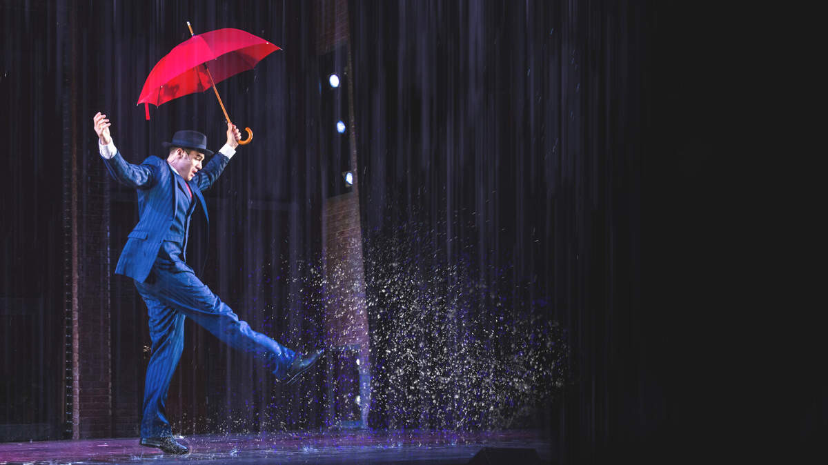 Alex Puette is Don Lockwood in the Arts Center of Coastal Carolina production of "Singin' in the Rain," put on in the winter of 2014.