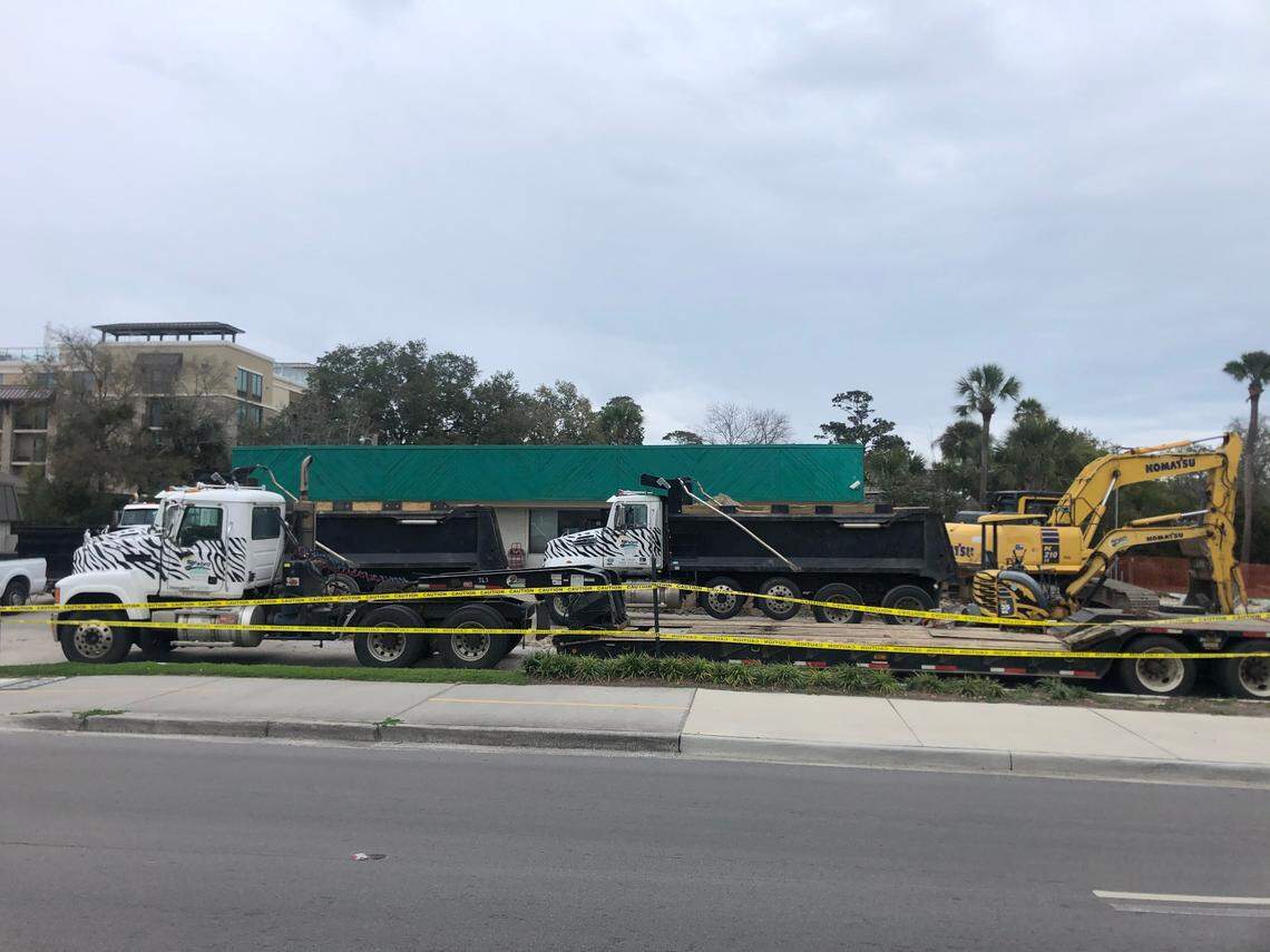 Crews remove underground gas tanks from the Kangaroo Express gas station March 2, 2021, on Pope Avenue.