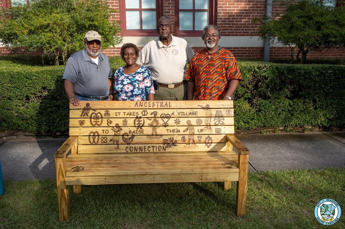 Artist Hank Herring, far right, poses with Washington Street Park sponsors with “Ancestral Connection.” Herring is the owner of Green Herring Art and Framing Studio on Bay Street.