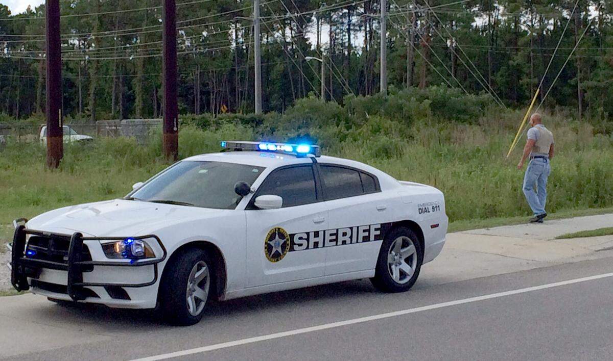 A Beaufort County Sheriff’s Office patrol car parked on the shoulder of a road.