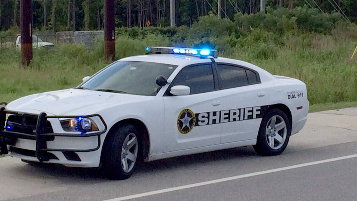 A Beaufort County Sheriff’s Office patrol car parked on the shoulder of a road.