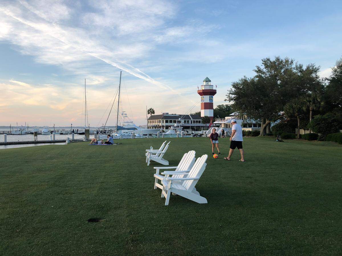 The 18th green of Harbour Town Golf Links, closed for COVID-19, became an impromptu park in early summer 2020. Families played and residents packed picnics around sunset with the iconic Harbour Town Lighthouse as their backdrop.