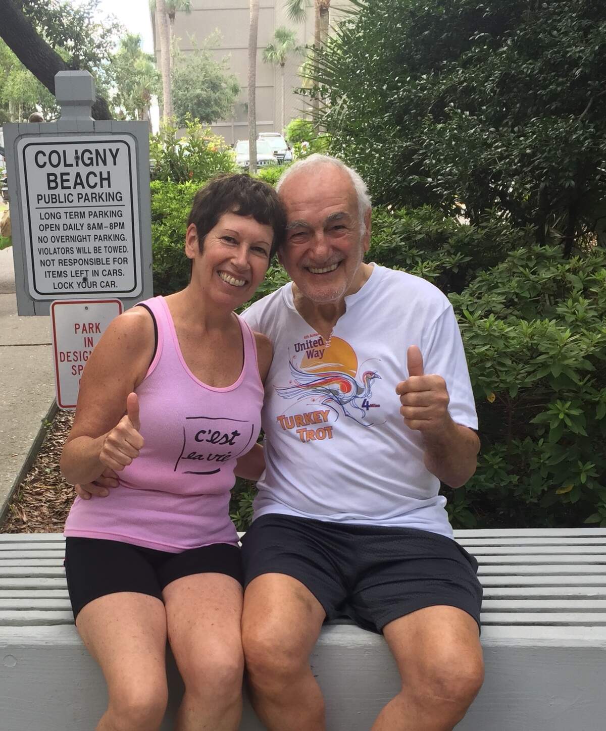Cathy and Tom Colasanto, of Savannah, Ga., sit on a bench on Sunday, Aug. 12, 2018, near Coligny Beach Park on Hilton Head Island, S.C.