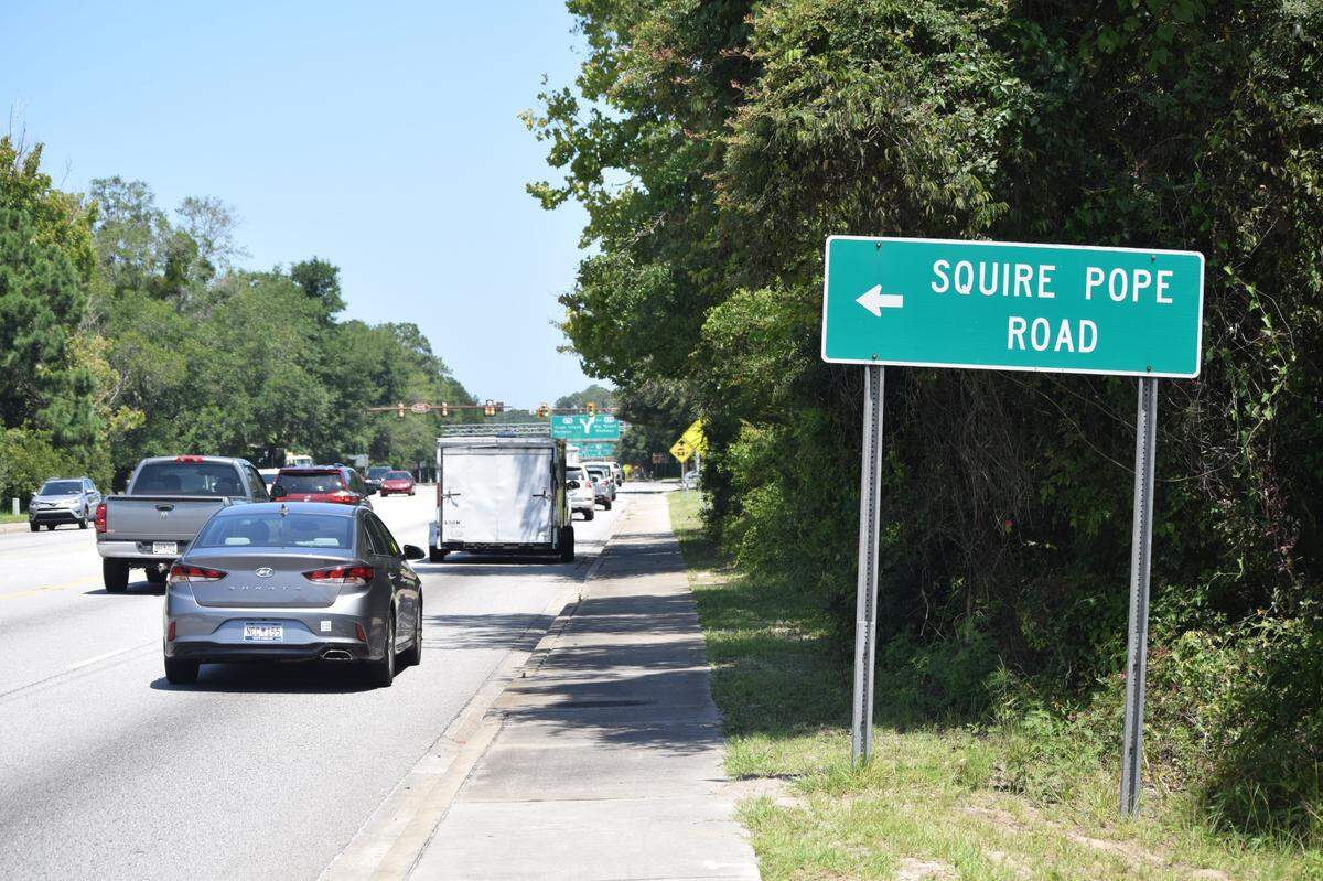 A sign for Squire Pope Road off U.S. 278 on Hilton Head Island in July 2021.