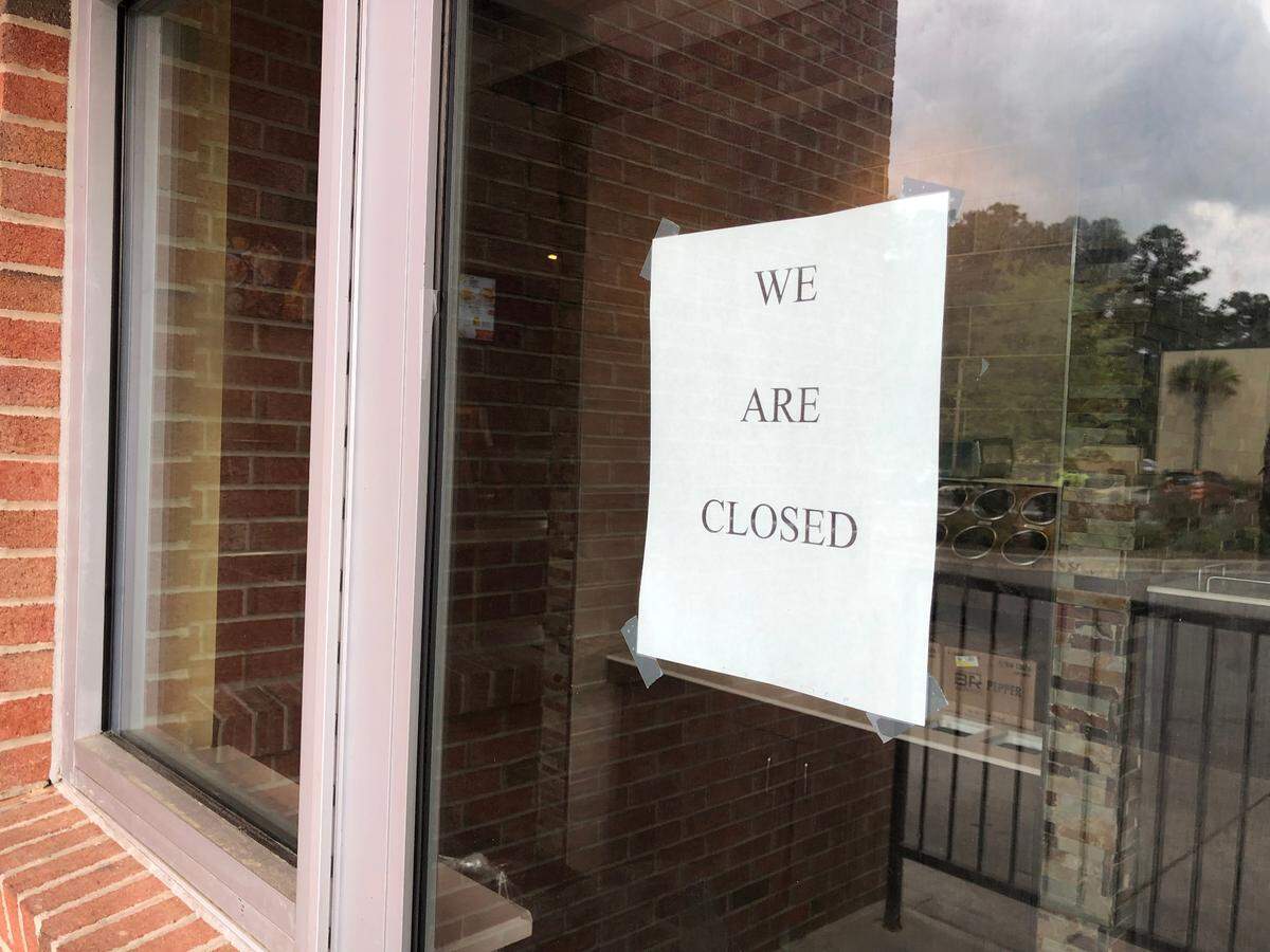 A sign on the door of the former Bluffton Bojangles location on Saturday, April 16, 2022.