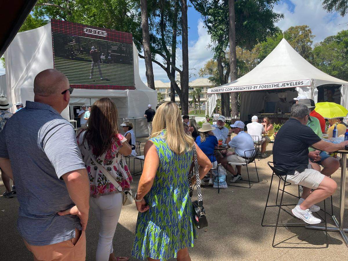 Spectators gathered in the concessions area to watch the live stream of Justin Thomas play on Friday, April 18, 2025