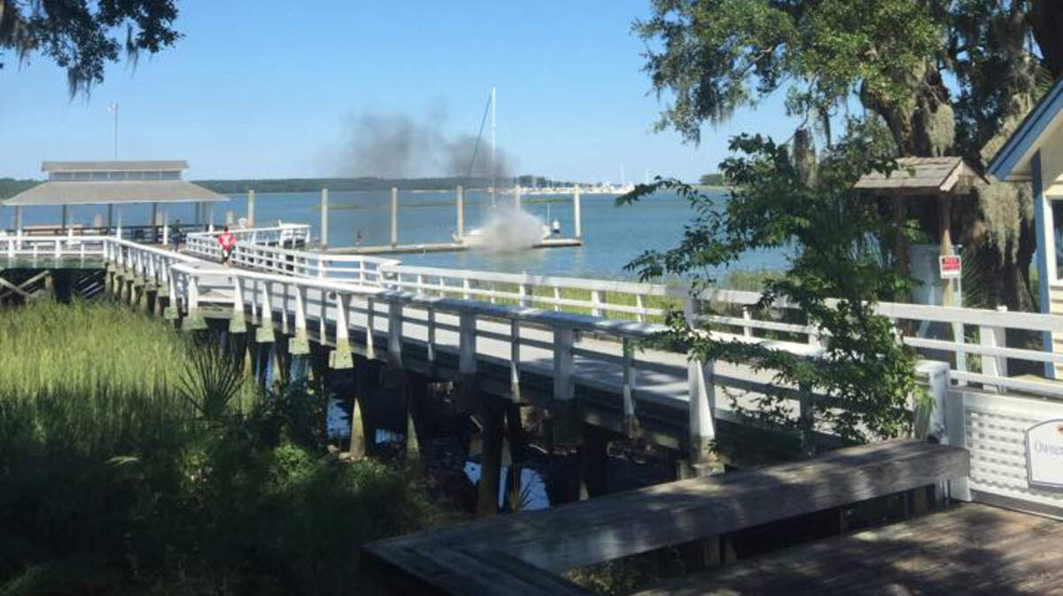 A small sailboat fire can be seen at Salty Faire Landing on Hilton Head Island the afternoon of Sept. 14, 2015. According to Hilton Head Fire & Rescue, the fire was started by an electrical malfunction. There were no injuries.