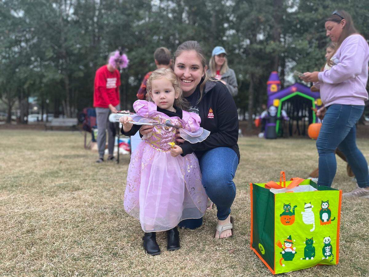 Maddox Tucker, 3, was dressed as Rapunzel for the pre-Halloween festivities at Oscar Frazier Park.