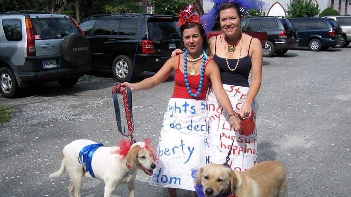 Bluffton Liberty Belles ready for the iconic Fourth of July Children’s parade. Fancy Nancy Jones and Tat Guscio with their furbabies are ready to celebrate.