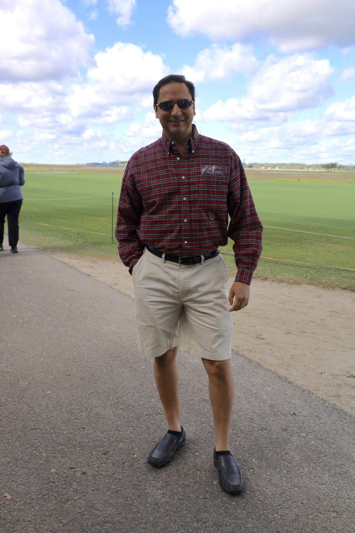 Dr. Atul Gupta of Hilton Head Island wears a plaid shirt. “We’ve attended Heritage for 16 years and love when we can celebrate with friends and family,” he said.