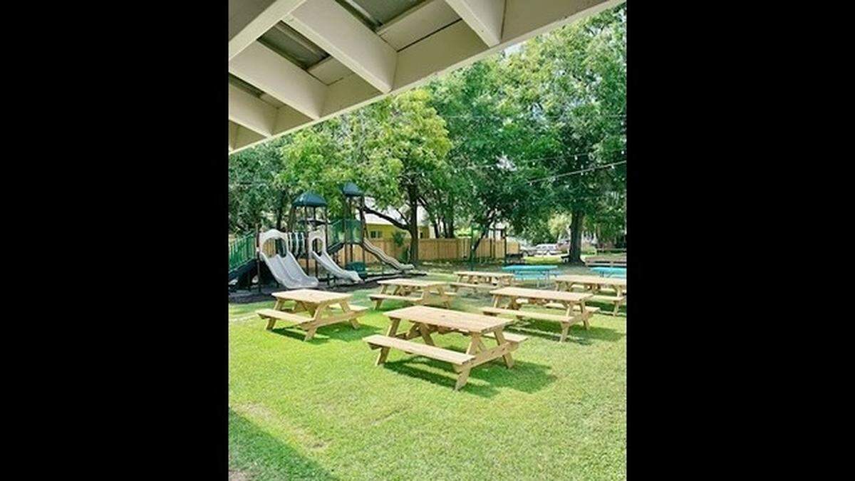 The outdoor area at GG’s in Port Royal including dining space and a play area for children.