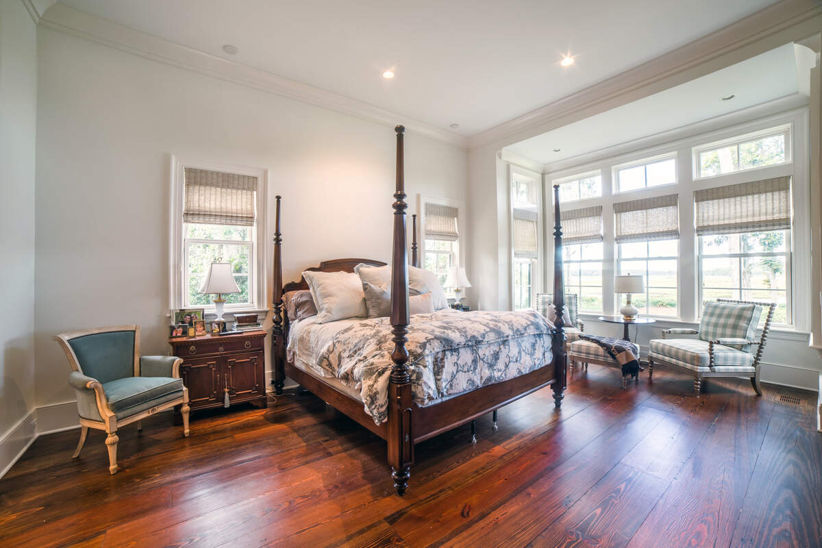 Antique heart pine flooring used in the Palmetto Bluff home was reclaimed from an 1890s cigarette factory in Louisville, Kentucky.