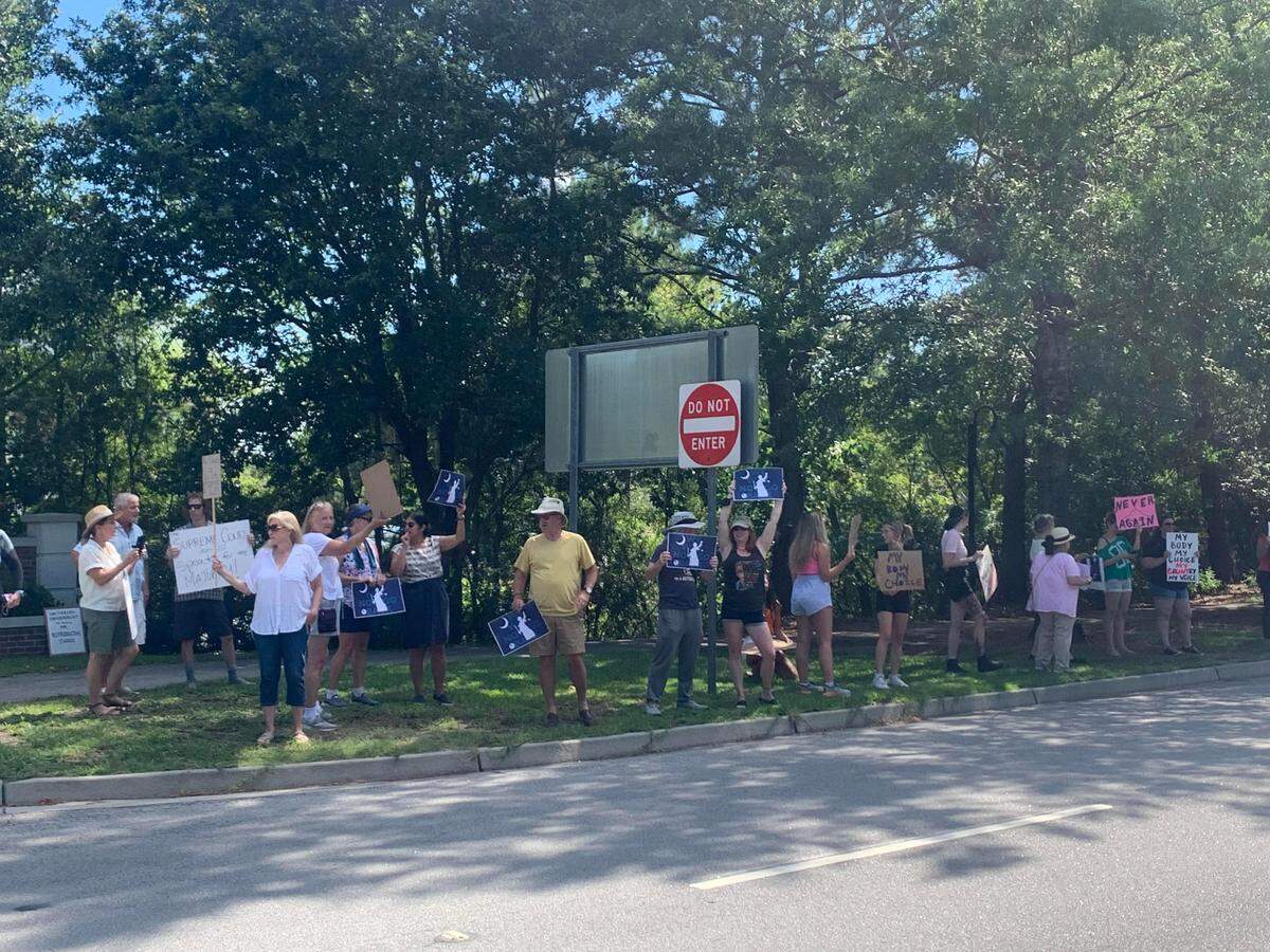 Abortion rights protesters lined Bluffton Parkway on Saturday.