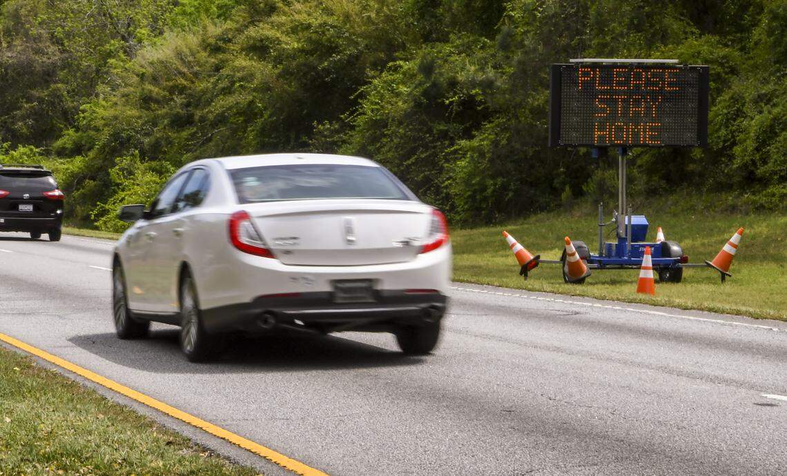 A digital sign informs drivers headed east on U.S. 278 toward Hilton Head Island to “please stay home” as seen on Monday, March 30, 2020, on Jenkins Island. Text on the digital sign loops with three phrases: Please stay home. Practice social distance. March 27 3 cases on HHI. This sign appeared after local government leaders were informed a ‘stay at home’ ordinance would not be enforced by the sheriff’s office.
