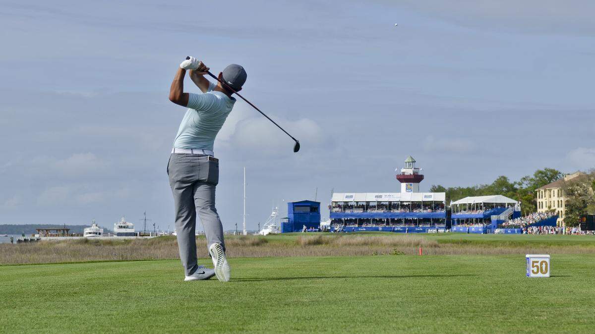 C. T. Pan watches the trajectory of his ball as it heads to the green of the 18th hole during the third round of last year’s RBC Heritage Presented by Boeing.