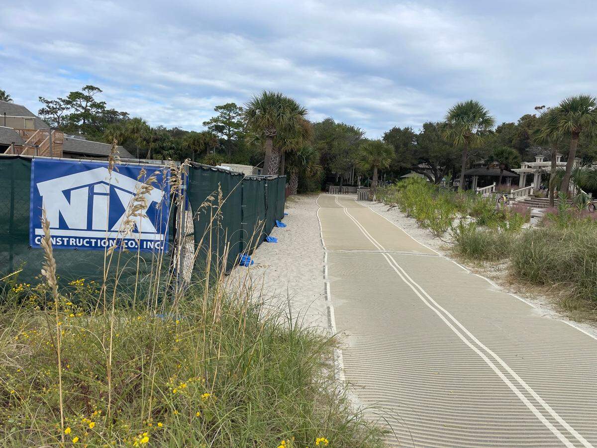 Green fences and sandbags at Beach House Hilton Head Island’s construction zone next to Coligny Beach Park on Friday, Nov. 3, 2023.