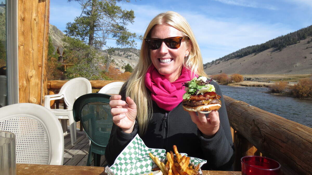 Beaufortonian Kelly Will eats a burger in Stanley, Idaho, which has a population of 63.