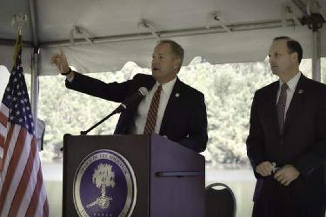 Fourteenth Circuit Solicitor Duffie Stone, left, introduces S.C. Attorney General Alan Wilson, who delivered the keynote address during Thursday’s ceremony opening the 14th Circuit Victims Services Center. The center, the first of its kind in South Carolina, provides services for victims of domestic violence, sexual assault and other crimes against vulnerable populations. The facilities include an exam room and forensic interview room.