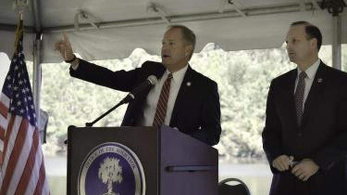 Fourteenth Circuit Solicitor Duffie Stone, left, introduces S.C. Attorney General Alan Wilson, who delivered the keynote address during Thursday’s ceremony opening the 14th Circuit Victims Services Center. The center, the first of its kind in South Carolina, provides services for victims of domestic violence, sexual assault and other crimes against vulnerable populations. The facilities include an exam room and forensic interview room.