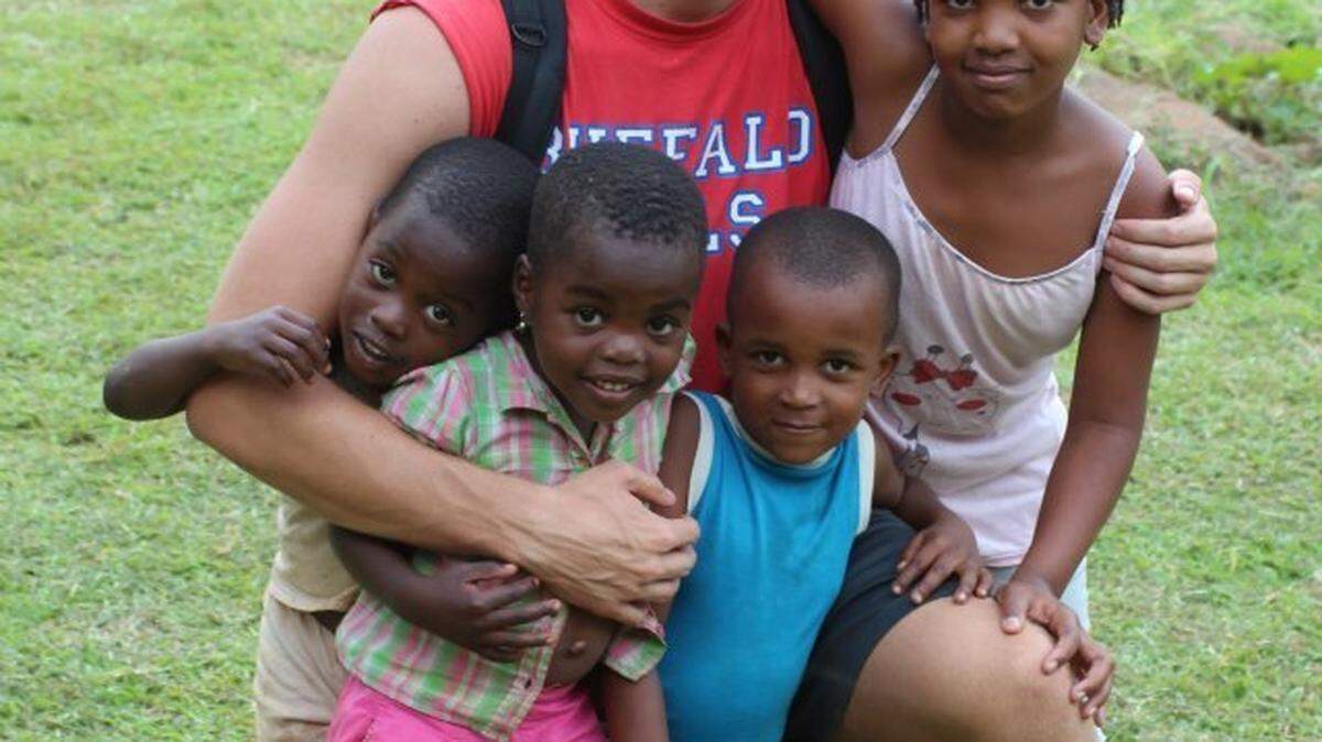 Mac Segars of St. Helena Island with students in Mozambique, Africa, where he is a Peace Corps volunteer.