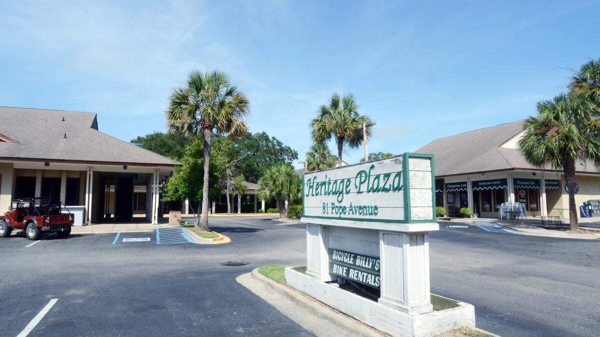 The company behind Shelter Cove Towne Centre is planning to build a six-story hotel in the heart of Hilton Head Island's bustling Coligny area. The 100-guest-room hotel would replace offices and shops in the back of  the Heritage Plaza shopping center on Pope Avenue, directly behind New York City Pizza and Plantation Cafe, pictured at left and right, respectively. Plans include five floors of guest rooms and a sixth-floor rooftop pool and patio with a small bar.