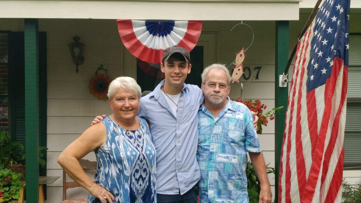 James Tucker McConnell, center, poses is pictured with his grandmother, Johnnie Everett, and grandfather, Mike Everett.