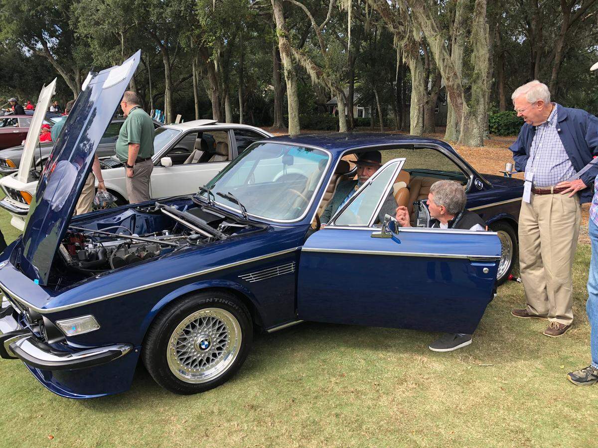 Gary Beck of Duluth, Georgia, sits behind the wheel of his 1972 BMW 3.0 CS at Saturday’s Car Club Showcase, part of the Concours d’Elegance on Hilton Head Island.