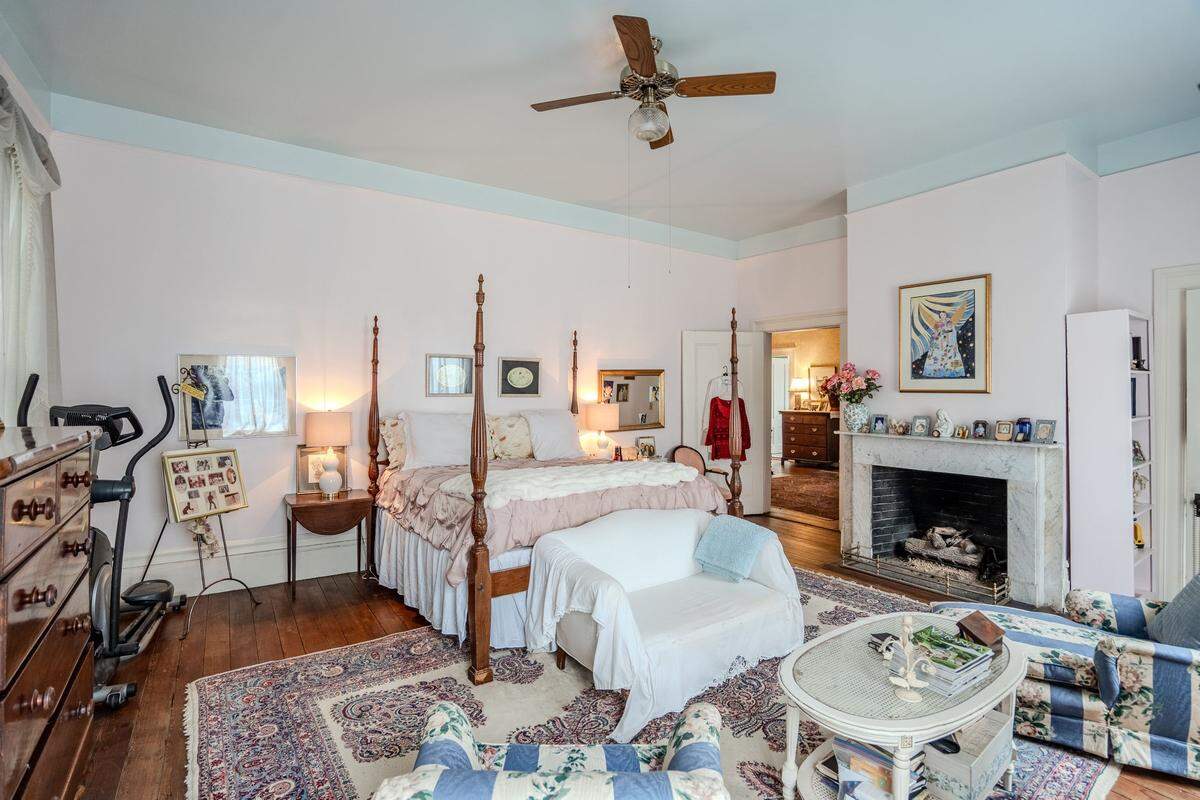 Each of the primary rooms in the Edward Means House is anchored by a marble mantel and fireplace.
