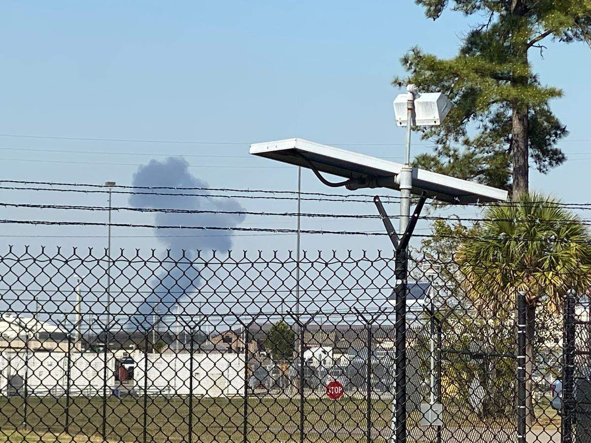 A plume of smoke rises after a military jet from MCAS Beaufort crashed in an area near Halfmoon Island on Thursday, March 3, 2022 in northern Beaufort County.