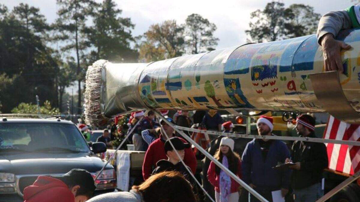 The LowCounty Community Church's float in Bluffton's Dec. 5, 2015, Christmas Parade showcased their Guinness Book of World Records contender for world's largest paintbrush.