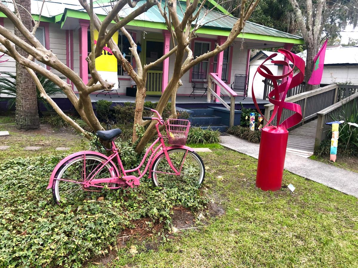 A pink bicycle stands in front of the Maye River Gallery in Old Town Bluffton in January 2022. The artists are moving to a new location later this year.