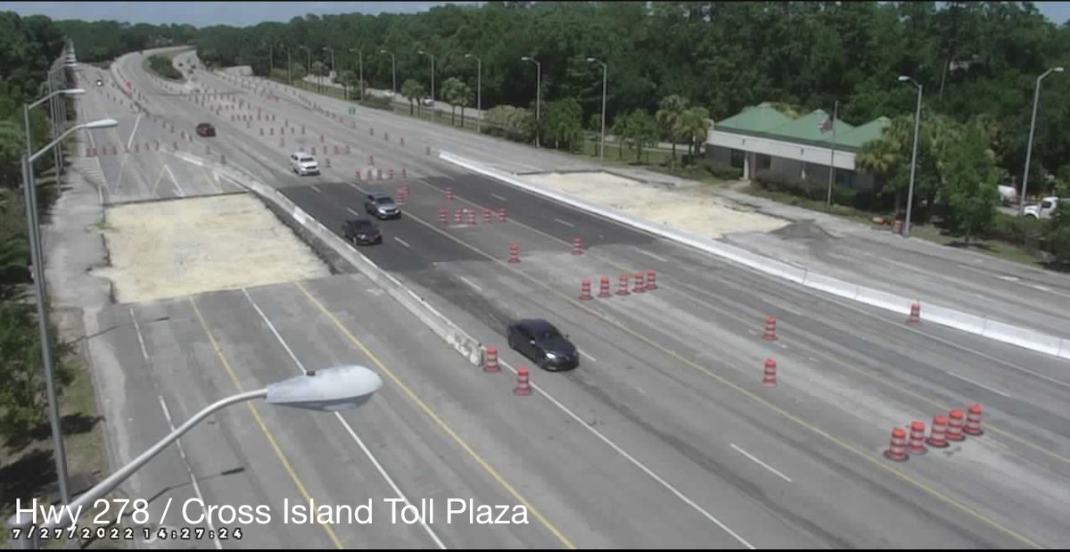 Vehicles drive past cones where the toll booths used to be on Hilton Head’s Cross Island Parkway on Wednesday.