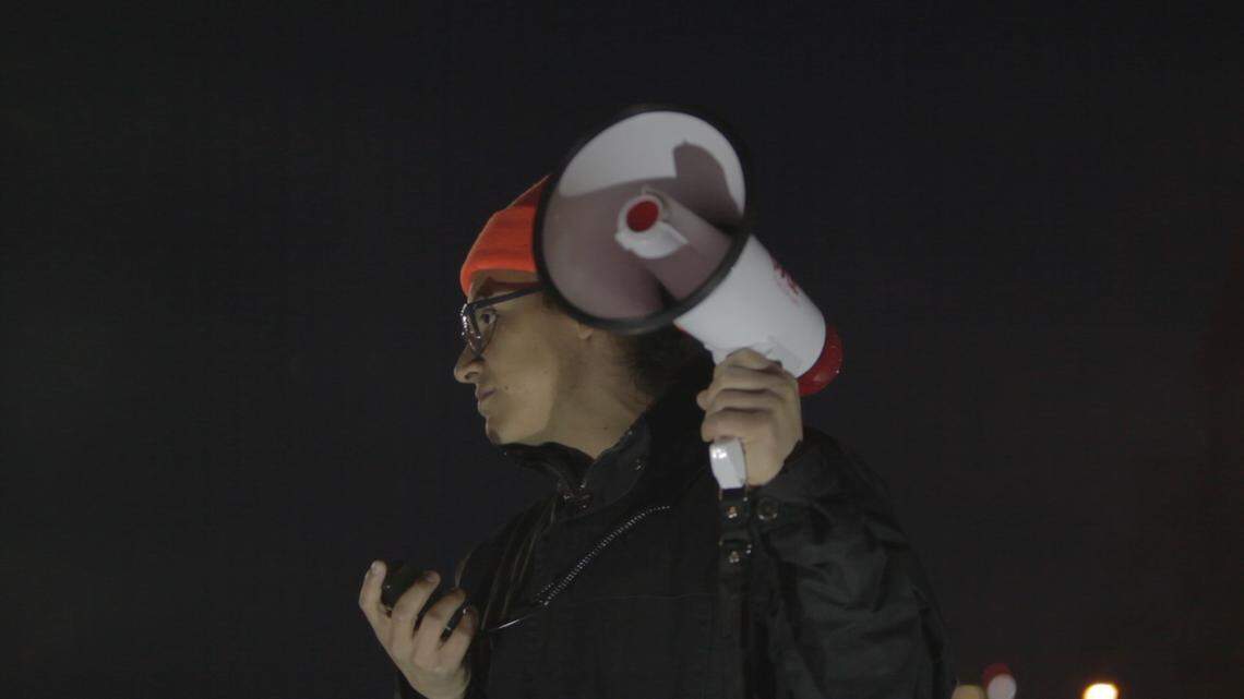 Victor Morales speaks during a protest in downtown Kansas City, Mo.
