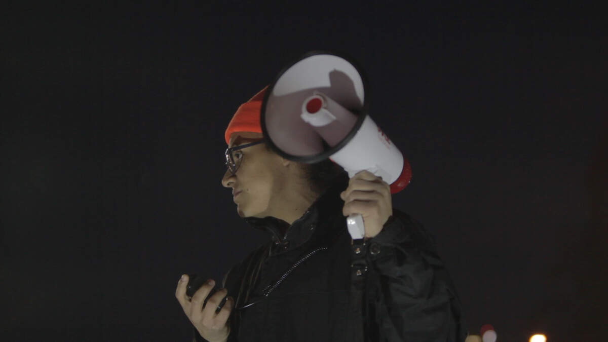 Victor Morales speaks during a protest in downtown Kansas City, Mo.